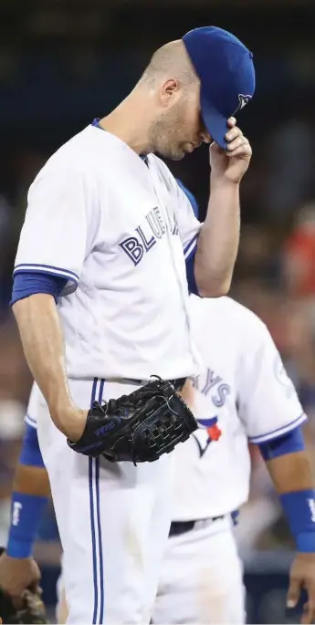  ?? TOM SZCZERBOWS­KI/GETTY IMAGES ?? Blue Jay Cy Young contender J.A. Happ saw his 11-game win streak snapped by the team he’s never beaten.