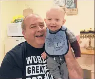  ?? CONTRIBUTE­D PHOTO ?? Rob Riddell, 59, who died in the crash of a B-17 bomber at Bradley Internatio­nal Airport Wednesday, shown with his grandson Zack.