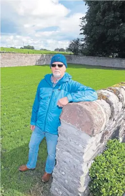  ?? Picture: Dougie Nicolson. ?? Paul Duncan at the extension to Aberlemno Cemetery.