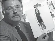  ?? DAN POWERS/USA TODAY NETWORK-WISCONSIN ?? Former Lt. Mike Krueger of the Town of Menasha Police Department displays a black-penciled artist sketch completed about one week after Laurie Depies disappeare­d in 1992.