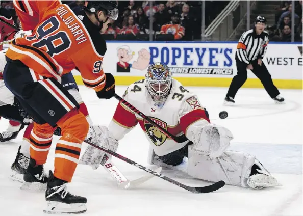  ?? DAVID BLOOM ?? Edmonton Oilers forward Jesse Puljujarvi is stopped by the Florida Panthers goaltender James Reimer Monday at Rogers Place as the Panthers were 7-5 winners.