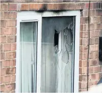  ??  ?? ●●A window was seen smashed outside the property on Fairfield Road, in Middleton