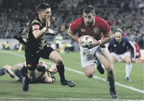  ??  ?? 0 Scotland winger Tommy Seymour scores his second try during the Lions’ 31-31 draw with Hurricanes at Westpac Stadium.