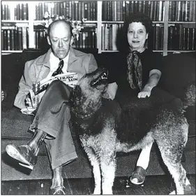  ?? Democrat-Gazette file photo ?? Arkansas writer John Gould Fletcher and his wife, author Charlie May Simon, and the family dog.