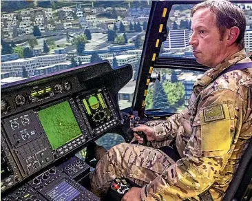  ?? WARWICK SMITH/STUFF ?? Squadron leader Ben Pryor flies the NH90 simulator Ojakea