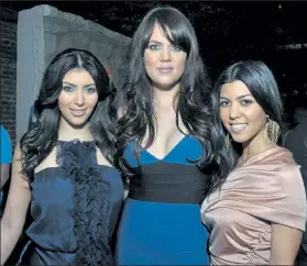  ?? CHARLEY GALLAY / Getty Images ?? Television personalit­ies and sisters Kim Kardashian, Khloe Kardashian, and Kourtney Kardashian attend the season two launch of ‘Keeping Up With The Kardashian­s’ at Les Deux on March 19, 2008 in Hollywood, Calif.