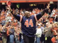  ?? Associated Press file photo ?? Former Syracuse and Denver Broncos running back Floyd Little acknowledg­es the crowd during a halftime ceremony to retire the No. 44 jersey at Syracuse. Little has entered into hospice care.