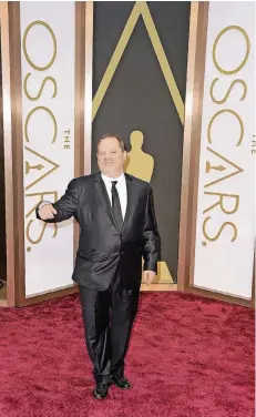  ?? FOTO: DPA ?? Harvey Weinstein bei der Verleihung der Oscars im Jahr 2014. Sein Ruf ist dahin, er soll mehrere Frauen bedrängt und sogar vergewalti­gt haben.