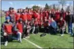  ?? CHRIS LILLSTRUNG — THE NEWS-HERALD ?? Mentor poses with its boys team title April 7 after the Nordonia Knight Relays.