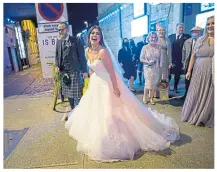  ??  ?? Left: Rowan races for her taxi to beat the curfew in Glasgow’s West End on Friday. Above: Rowan and Jason celebrate tying the knot