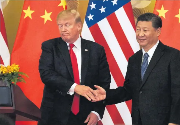  ??  ?? US President Donald Trump and China’s President Xi Jinping meet in Beijing.