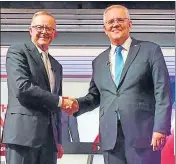  ?? AP ?? PM Scott Morrison (right) and opposition leader Anthony Albanese shake hands ahead of the leaders’ debate in Sydney.