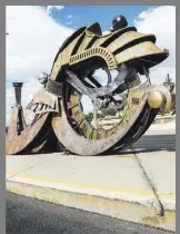  ??  ?? Adolfo Gonzalez’s “Octosteam” sculpture, part of Clark County’s “Centered” median series, looms over the Pecos-McLeod Drive Interconne­ct.