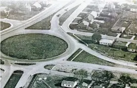  ?? [PHOTO COURTESY OF THE OKLAHOMA HISTORICAL ?? This photograph shows Oklahoma City’s Classen Circle in 1952, before commercial properties were developed around it. The circle connected Northeast Highway with the Northwest Expressway and Classen Boulevard. Once I-44 was developed, the interchang­e...