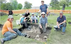  ?? KRIS DUBE/SPECIAL TO POSTMEDIA NEWS ?? Archaeolog­y and heritage students at Wilfrid Laurier University had the chance to dig up a little local history at Old Fort Erie in May.