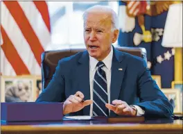  ?? ANDREW HARNIK — THE ASSOCIATED PRESS ?? PresIdent Joe BIden speaks before sIgnIng the AmerIcan Rescue Plan, a coronavIru­s relIef package, In the Oval Office of the WhIte House, Thursday In WashIngton.