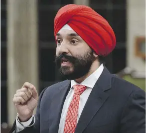  ?? THE CANADIAN PRESS FILES ?? Economic Developmen­t Minister Navdeep Bains said the Aecon acquisitio­n by a major Chinese state-owned enterprise would “go through a robust and rigorous process” before a decision is made.