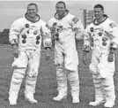  ?? AP ?? In December 1968, the crew of Apollo 8 – Frank Borman, left, Jim Lovell and William Anders – became the first to circle the moon.