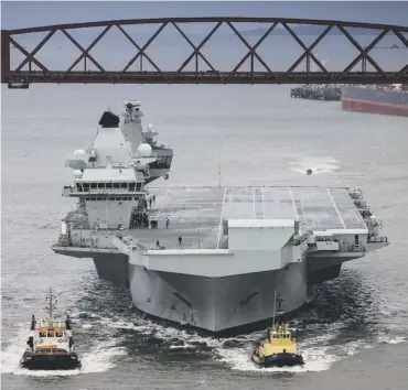  ?? ?? 0 HMS Queen Elizabeth returns to her birth place for a scheduled period of maintenanc­e