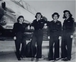  ?? JOURNAL SENTINEL ?? WASP Ethel (Jones) Sheffler, left, is shown in this circa World War II photo with other pilots at the Experiment­al Aircraft Associatio­n Aviation Museum in Oshkosh. It will be part of a temporary exhibit honoring the Women Airforce Service Pilots. It opens to the public March 10.