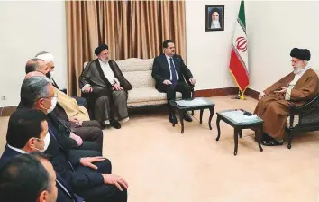  ?? AFP ?? ■ This handout picture provided by the office of Iran’s Supreme Leader Ayatollah Ali Khamenei shows him and President Ebrahim Raisi (third from right) meeting with Iraq’s Prime Minister Mohammad Shia Al Sudani (second from right) in Tehran yesterday.