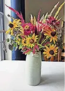  ?? PROVIDED BY ERIN HARLOW, UF/IFAS COLUMBIA COUNTY ?? A cut flower arrangemen­t featuring zinnias, rudbeckia, and celosia.