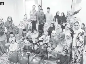  ??  ?? PSA rai anak yatim dari tujuh sekolah di sekitar Kota Kinabalu.