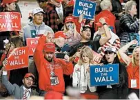  ?? JOE RAEDLE/GETTY ?? People await the arrival of President Trump at his border security rally Monday at the El Paso County Coliseum.