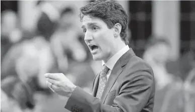  ??  ?? Prime Minister Justin Trudeau answers one of many questions during question period in the House on Wednesday.