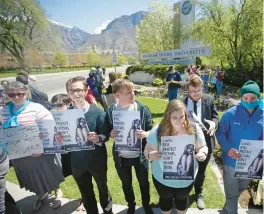  ?? RICK BOWMER/AP 2016 ?? Protesters at Brigham Young University in Provo, Utah, stand for rape victims. Proposed federal rules would widen colleges’ responsibi­lities on sexual misconduct.