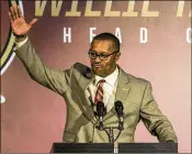  ?? MARK WALLHEISER / AP ?? Willie Taggart has made a positive impression on FSU’s players since being named head coach.