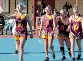  ??  ?? Above: Stacie Gardiner is all smiles as she lines up for a shot as Drouin conclude the year with a win.
Right: The Hawks share an inside joke during A grade as they conclude season 2019. The A graders are (from left) Stacie Gardiner, Alana Rippon, Kylie Proctor and Ruby Pratt.