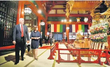  ??  ?? Pence with his wife Karen and daughters visit Sensoji Temple in Tokyo. — Reuters photo