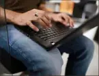  ?? Bloomberg ?? An employee works on a laptop at the headquarte­rs of security system developer Staqu Technologi­es Pvt. in Gurugram, Haryana, India.