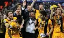  ?? Photograph: BPI/Rex Shut ?? Phil Brown celebrates with Southend’s players after winning the 2015 League Two play-off final.