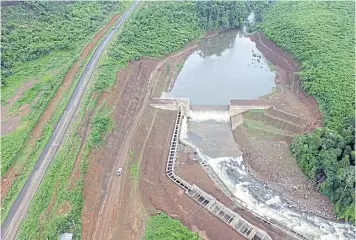  ??  ?? An aerial view of a B.Grimm hydropower project in Laos, where the company aims to build more power-generating projects.