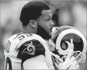  ?? Luis Sinco Los Angeles Times ?? AARON DONALD had a sack and three quarterbac­k hits in the Rams’ win over the Jaguars. He wants to be the NFL’s highest-paid defensive player.