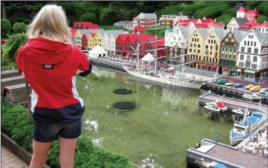  ?? (Rick Steves) ?? Denmark’s Legoland features 58 million Lego bricks, some assembled to represent famous landmarks from around the world, such as the historic Bryggen wharf in Bergen, Norway.