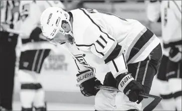  ?? David Zalubowski Associated Press ?? CENTER ANZE KOPITAR collects his thoughts during the third period of the Kings’ 7-1 loss to the Colorado Avalanche on Saturday in Denver. The Kings finished their three-game trip with a 1-1-1 record.