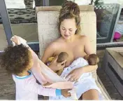  ??  ?? US celebrity Christy Teigen-Legend advocates breastfeed­ing. She is shown here with her children.