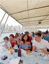  ?? — Photos by Dhes Handumon ?? People enjoying the view of the Dubai Marina during the launch of the High Tea at Sea cruise.