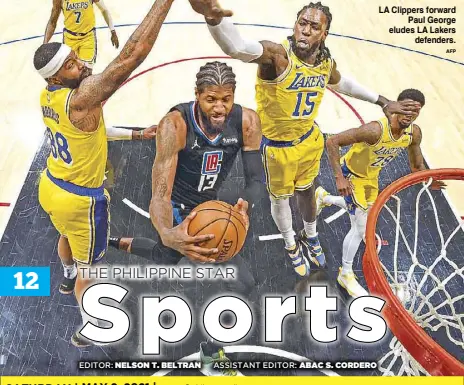  ??  ?? LA Clippers forward Paul George eludes LA Lakers defenders. AFP