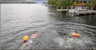  ?? Mike Lynch ?? Dave Wick, the executive director of the Lake George Park Commission, left, leads a team looking for milfoil on Lake George in July 2019.