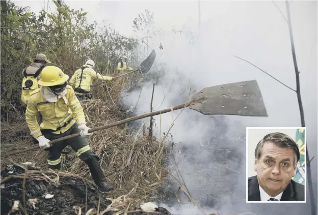  ??  ?? 0 Brazilian president Jair Bolsonaro, inset, will not accept internatio­nal aid to fight fires sweeping the Amazon basin unless French counterpar­t Emmanuel Macron apologises