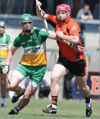  ??  ?? Duhallow’s Michael Vaughan attempts to break the Bride Rovers cover during the County SHC at Pairc Ui Rinn. Photo by John Tarrant