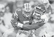  ?? [PHOTO BY IAN MAULE, TULSA WORLD] ?? Oklahoma defensive end Ogbonnia Okoronkwo is wearing a cast on his right wrist this week, but Sooners coach Lincoln Riley said the protection could be off or shortened by Saturday’s Bedlam game.