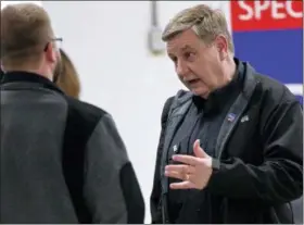  ?? KEITH SRAKOCIC — THE ASSOCIATED PRESS ?? Republican Rick Saccone, right, talks with supporters at a campaign rally in Waynesburg, Pa. Saccone is running against Democrat Conor Lamb in a special election being held on March 13 for the PA 18th Congressio­nal District vacated by Republican Tim...