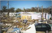  ?? LOREN ELLIOTT — TAMPA BAY TIMES VIA AP ?? Extensive damage from Hurricane Irma is seen at the Seabreeze Trailer Park in Islamorada, Fla., on Tuesday.