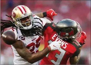  ?? DIRK SHADD/TRIBUNE NEWS SERVICE ?? Buccaneers wide receiver Mike Evans (13) is unable to come up with the catch as he is covered by 49ers cornerback Richard Sherman (25) on a 4th-and-6 on Sept. 8, 2019, in Tampa, Fla.