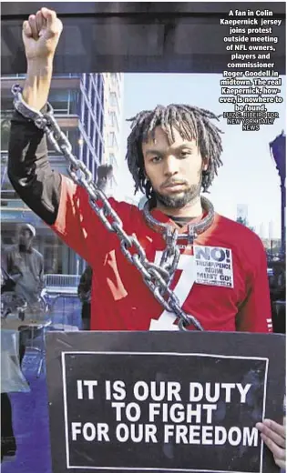  ?? LUIZ C. RIBEIRO FOR NEW YORK DAILY NEWS ?? A fan in Colin Kaepernick jersey joins protest outside meeting of NFL owners, players and commission­er Roger Goodell in midtown. The real Kaepernick, however, is nowhere to be found.